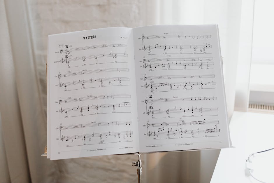 Elegant sheet music on a stand with soft natural light pouring through the window.